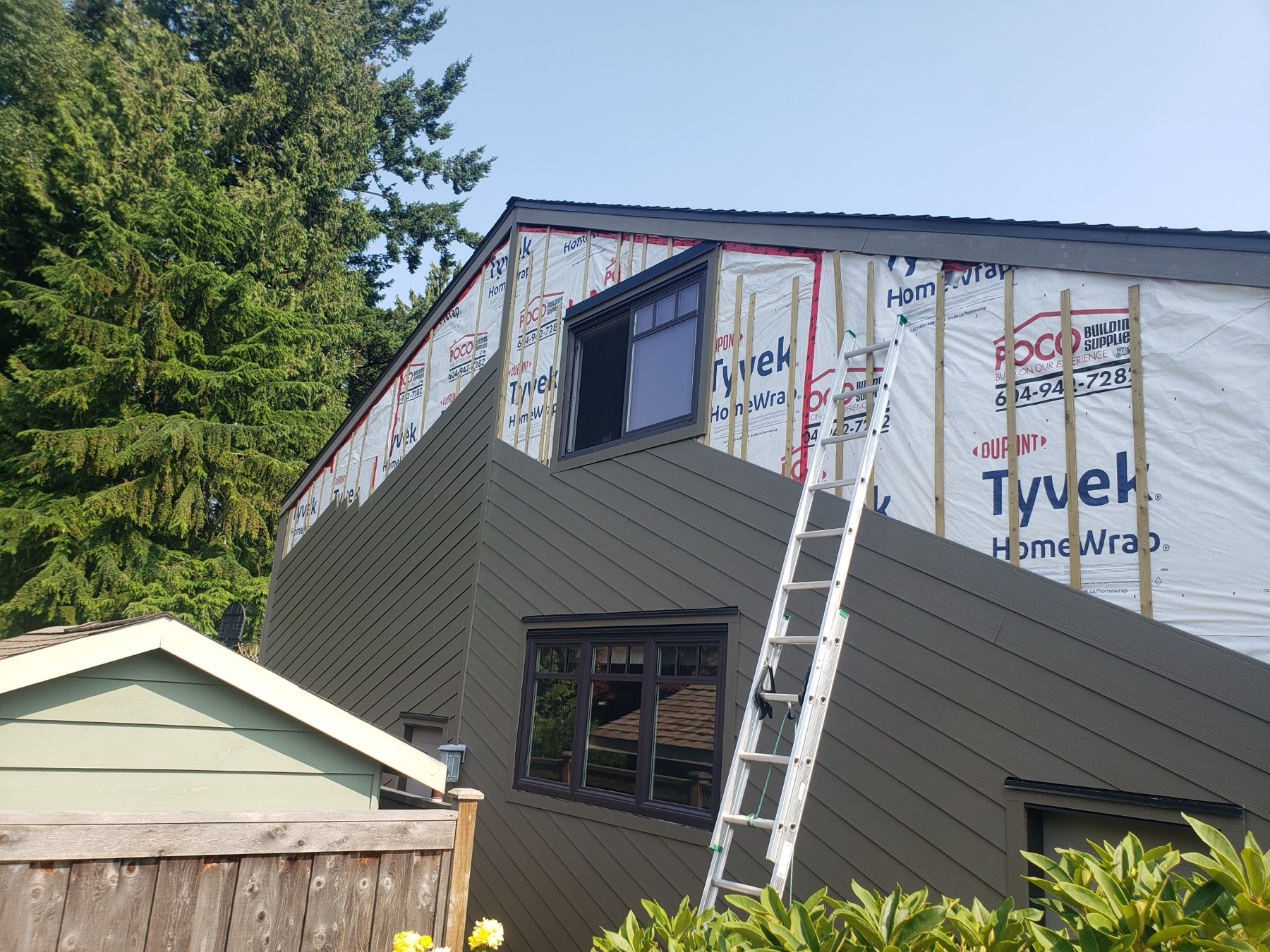 Cladding going on over the weather barrier