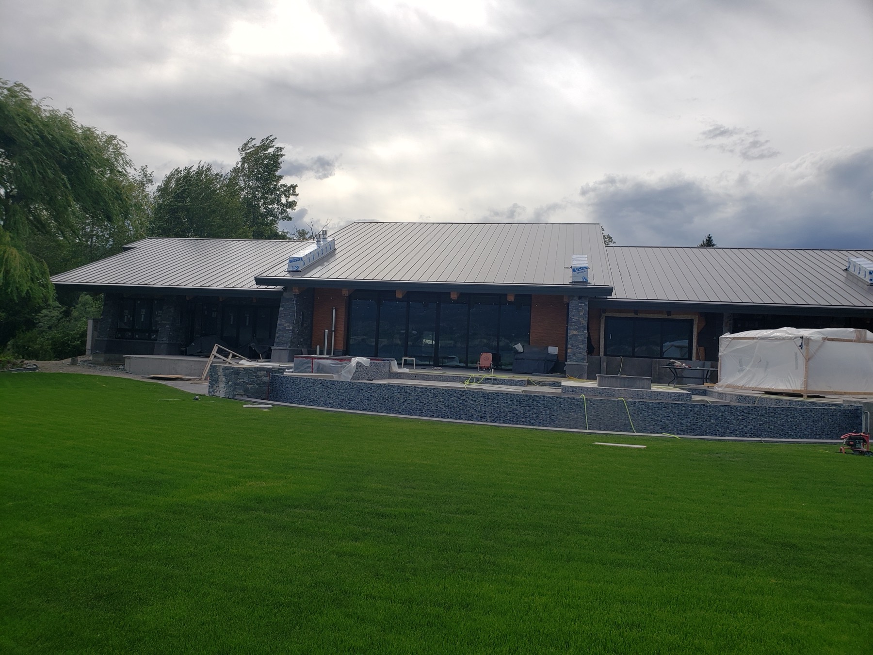 A long modern home with completed cladding