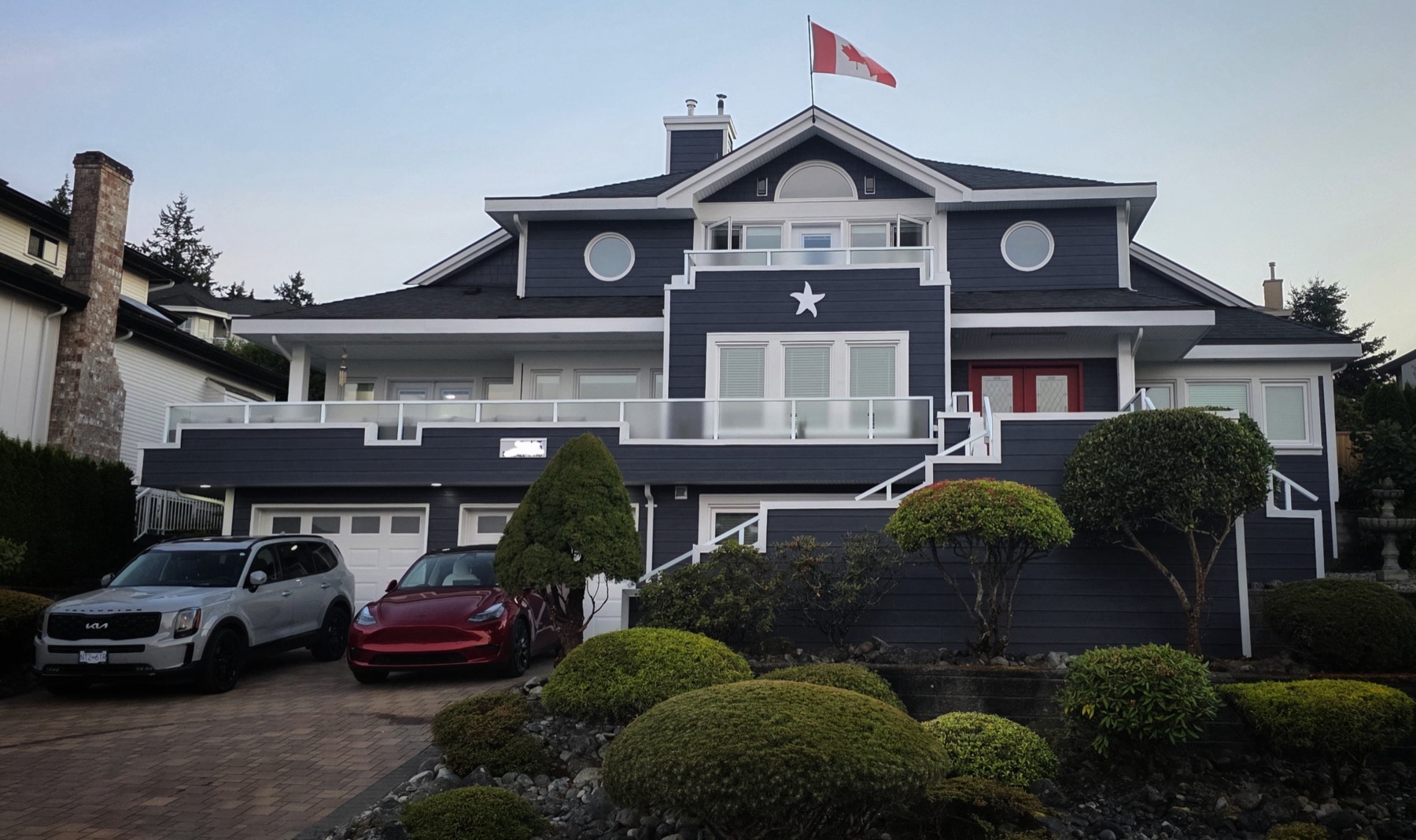 A large white heritage style home